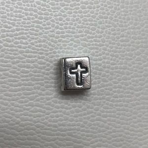 Retired bible pandora charm.